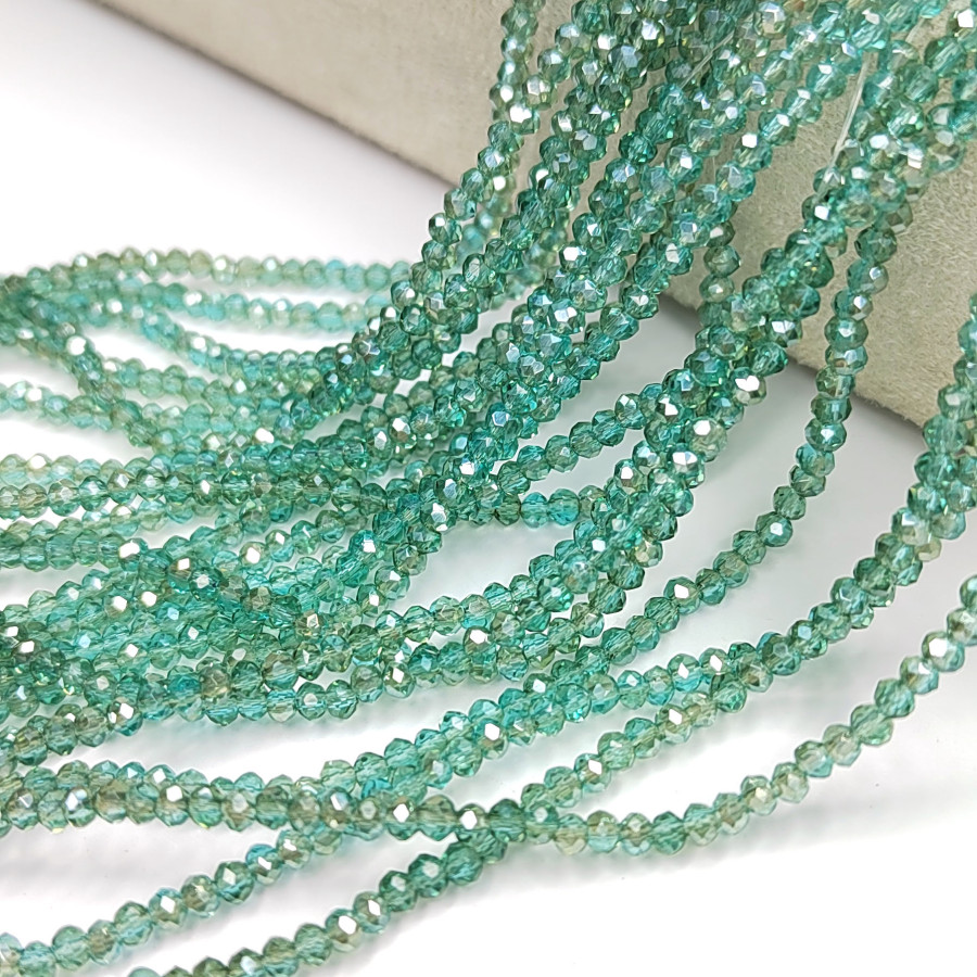 Рондели 3х2,5 мм стекло, светло - зелёные, нить 37-38 см