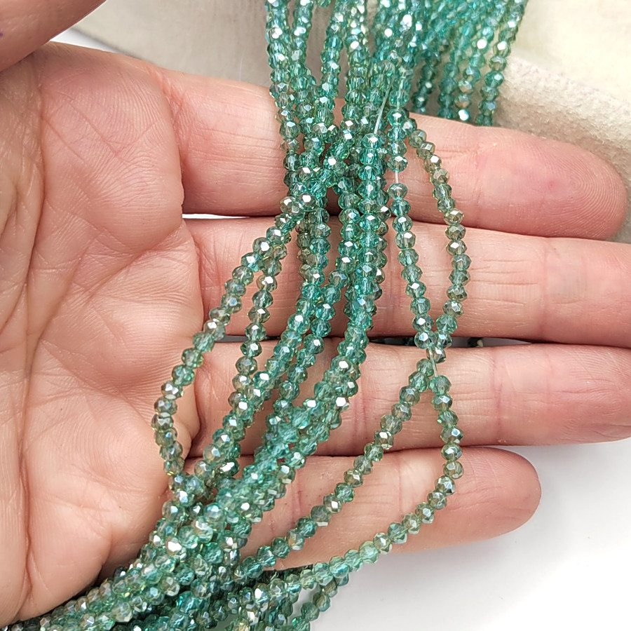 Рондели 3х2,5 мм стекло, светло - зелёные, нить 37-38 см