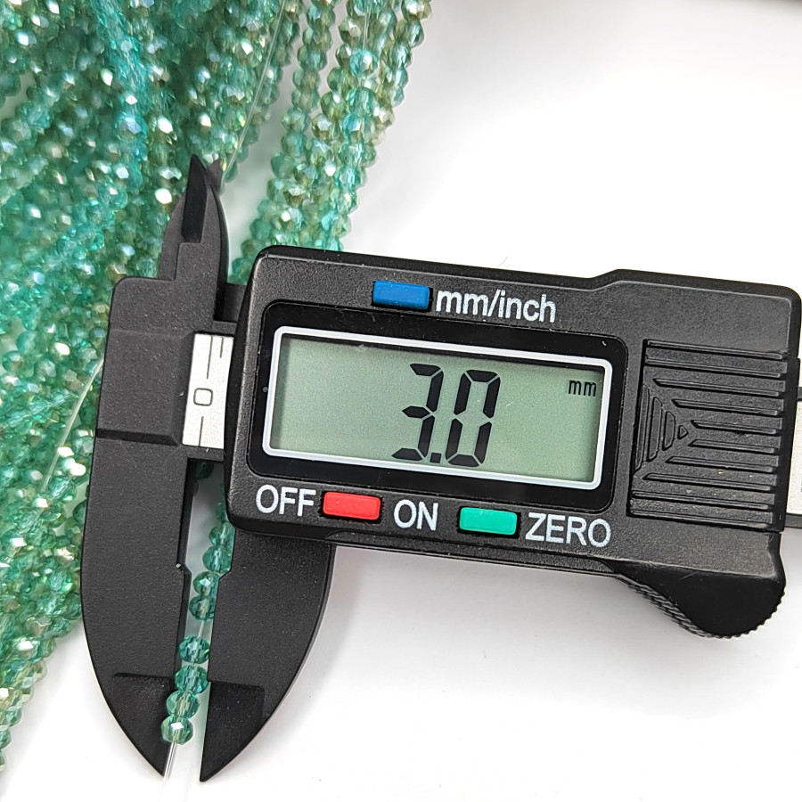 Рондели 3х2,5 мм стекло, светло - зелёные, нить 37-38 см