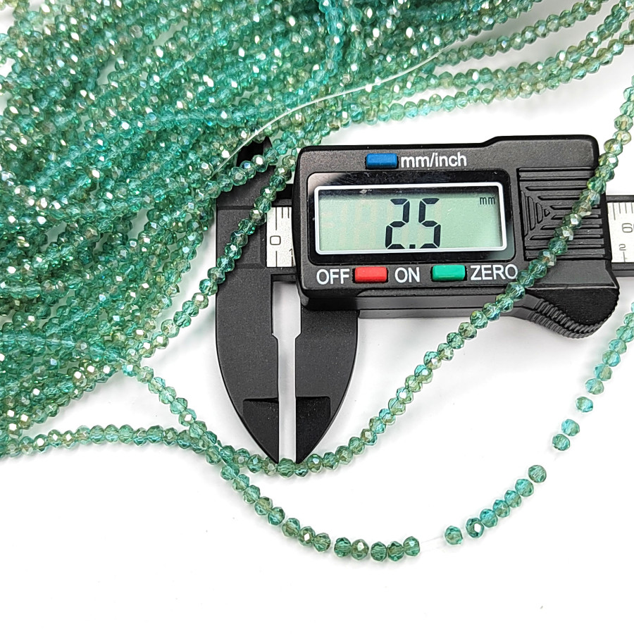 Рондели 3х2,5 мм стекло, светло - зелёные, нить 37-38 см