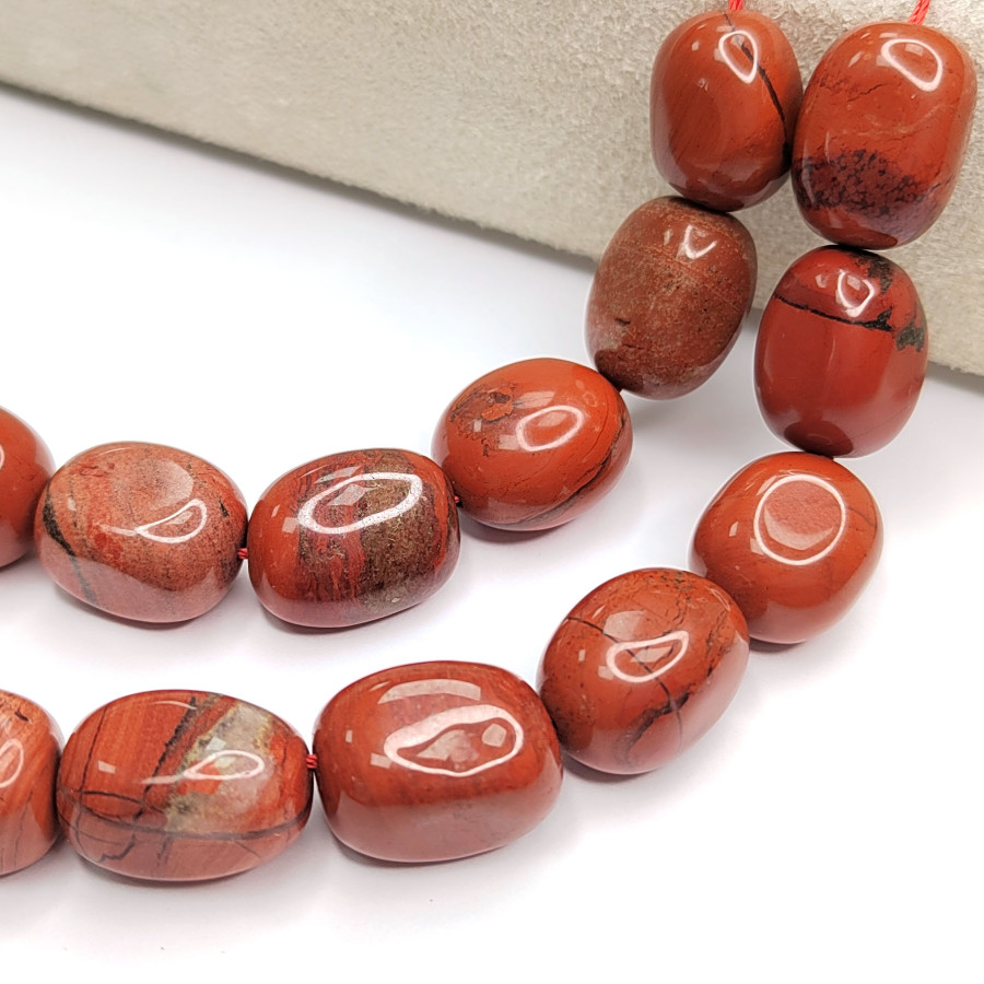 Яшма красная натуральная, бусина 17х11 мм Нить 38 см (22 бусины)