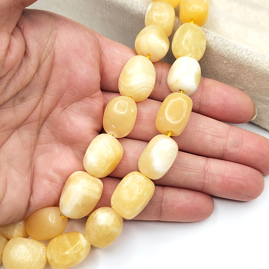 Кальцит натуральный камень 17х12 мм Нить 39 см (23 бусины)